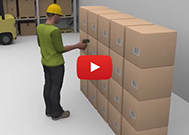 worker using a handheld rfid scanner to scan boxes of products